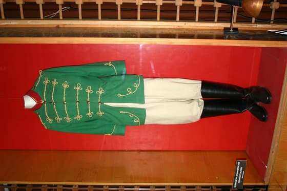 An insurgent uniform in a case in the exhibition hall