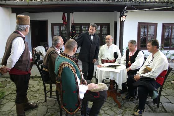 A scene from a re-enactment in the courtyard of the house-museum