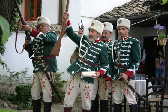 Members of the Traditsiya club in insurgent uniform during a commemoration