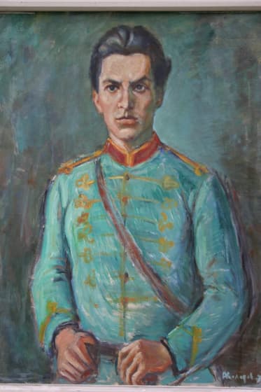 Painted portrait of Volov in insurgent uniform, on display at the museum