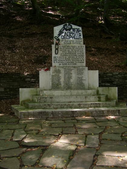 The monument at Oborishte, where the assembly met on 14 April 1876. The names of the apostles, headed by P. Volov, are carved in the stone.